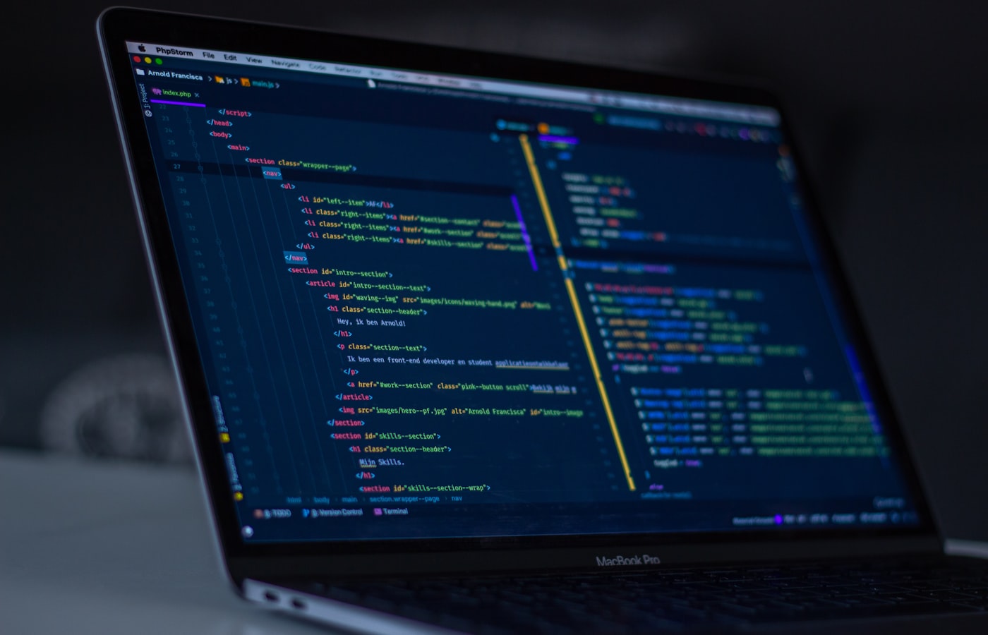 Developer writing code in a dark editor while shipping software